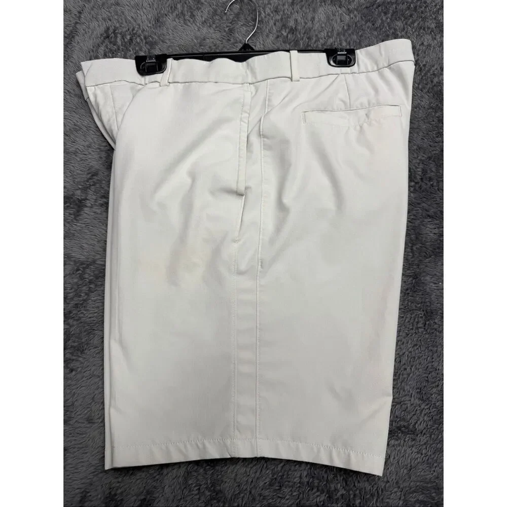 Nike Golf Tour Performance Khaki Shorts, Size Men’s 38. Color is beige.